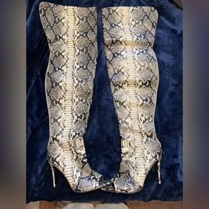 Thigh high animal print heels